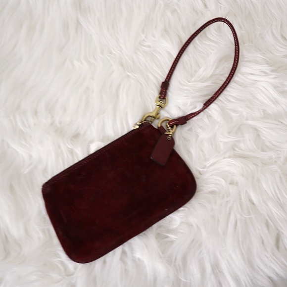 Coach Handbags - Used Coach burgundy suede wristlet